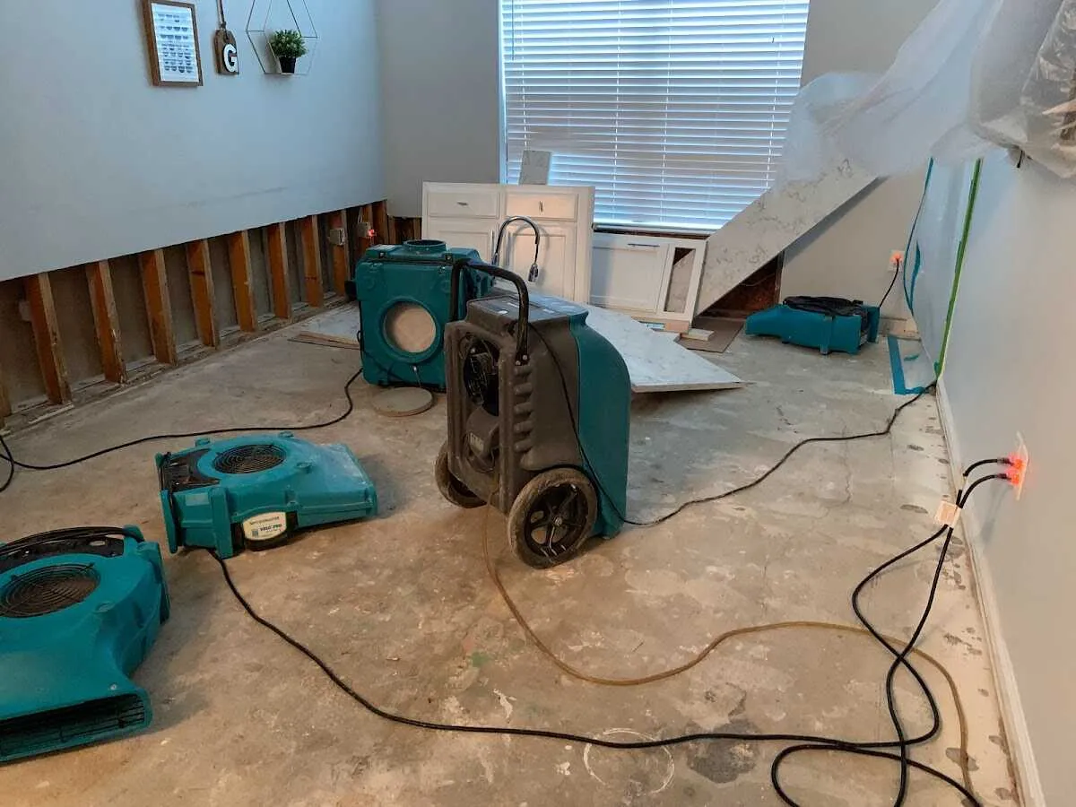 Dehumidifier in flood-cut room for Water Damage Restoration in Buckhall